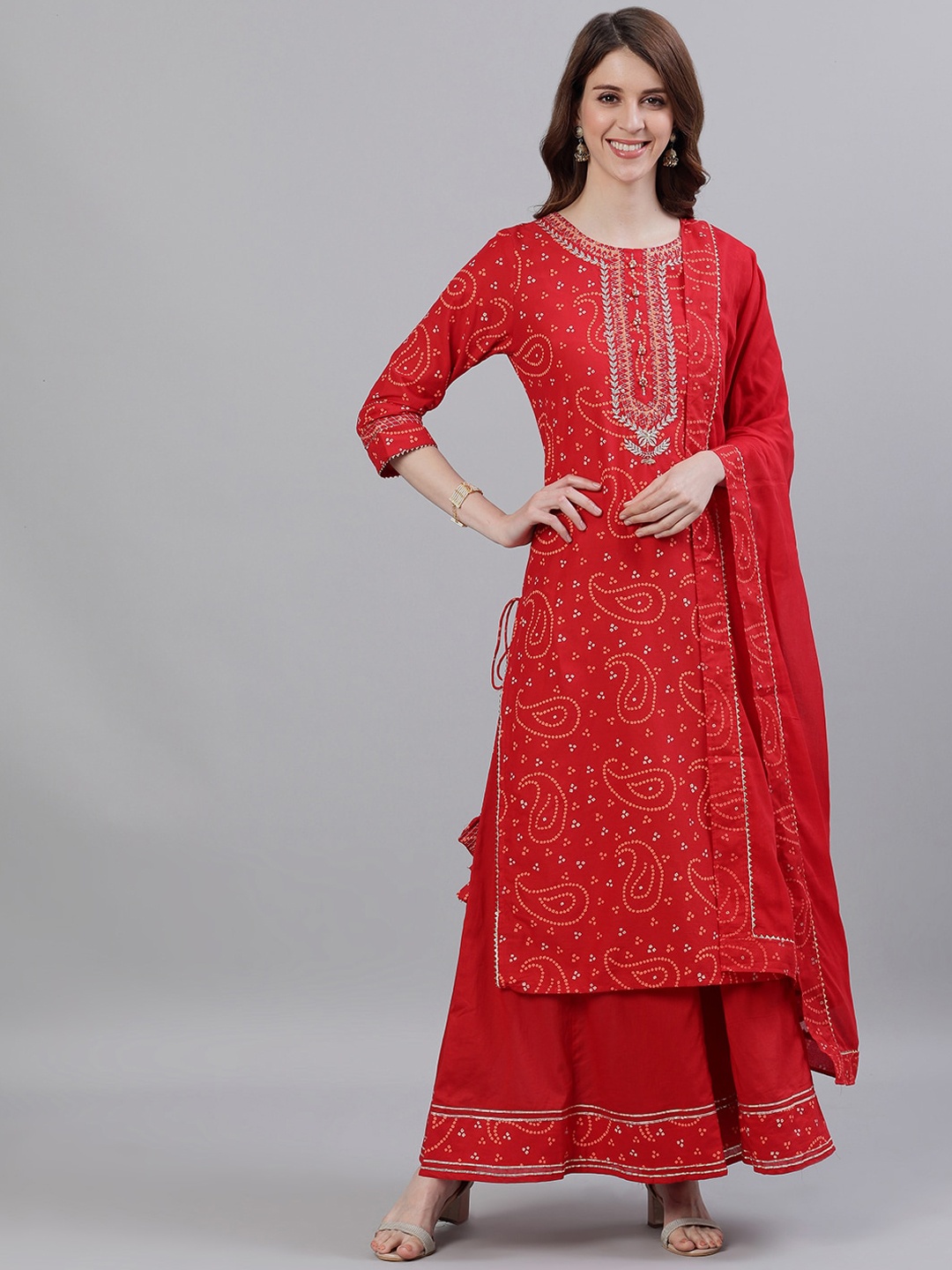 Ishin Women Red Bandhani Printed Embroidered Pure Cotton Kurta with Sharara & With Dupatta
Ishin Women Red Bandhani Printed Embroidered Pure Cotton Kurta with Sharara & With Dupatta