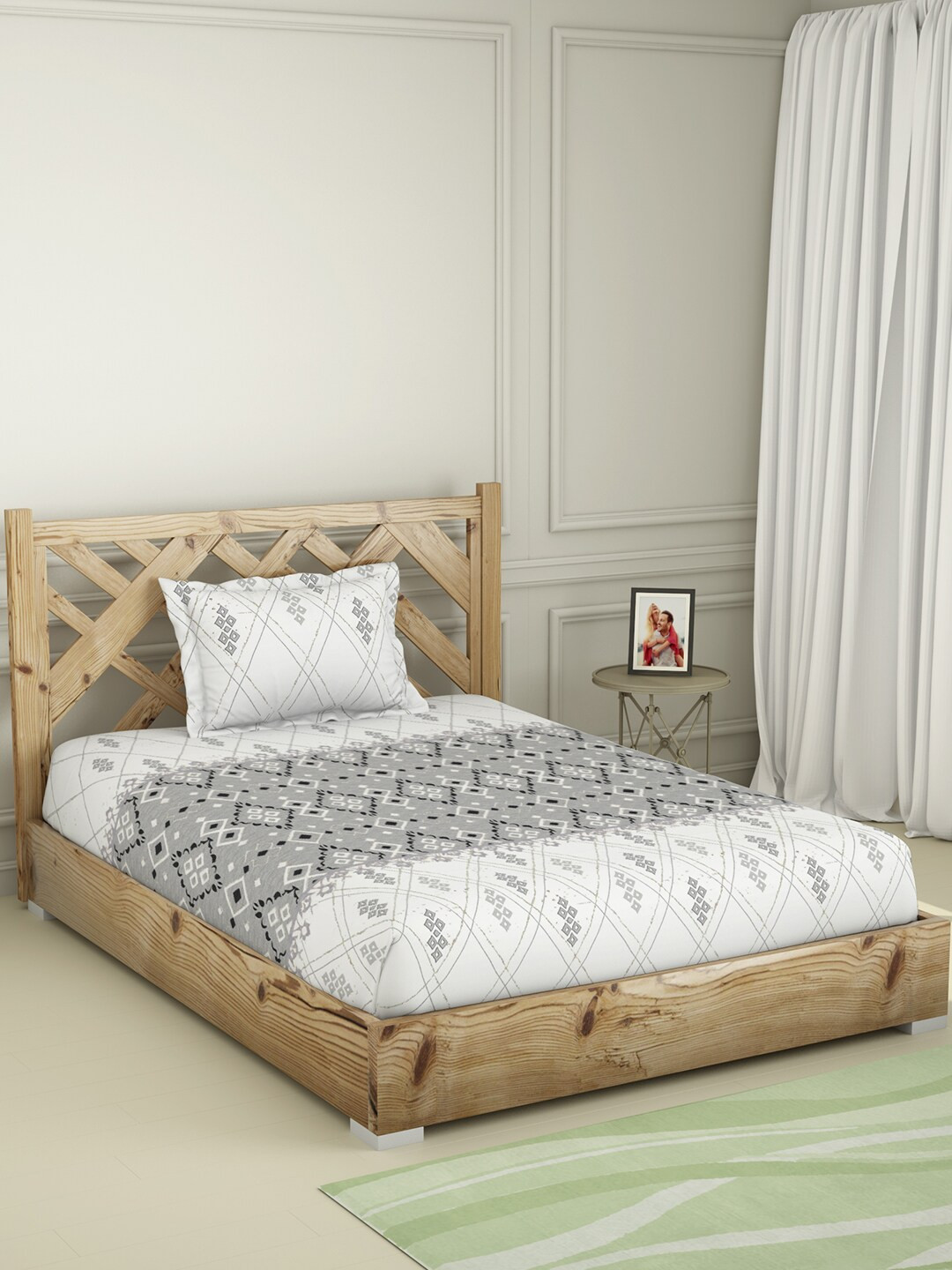 SPACES Grey & White Geometric 144 TC Single Bedsheet with 1 Pillow Covers 
SPACES Grey & White Geometric 144 TC Single Bedsheet with 1 Pillow Covers