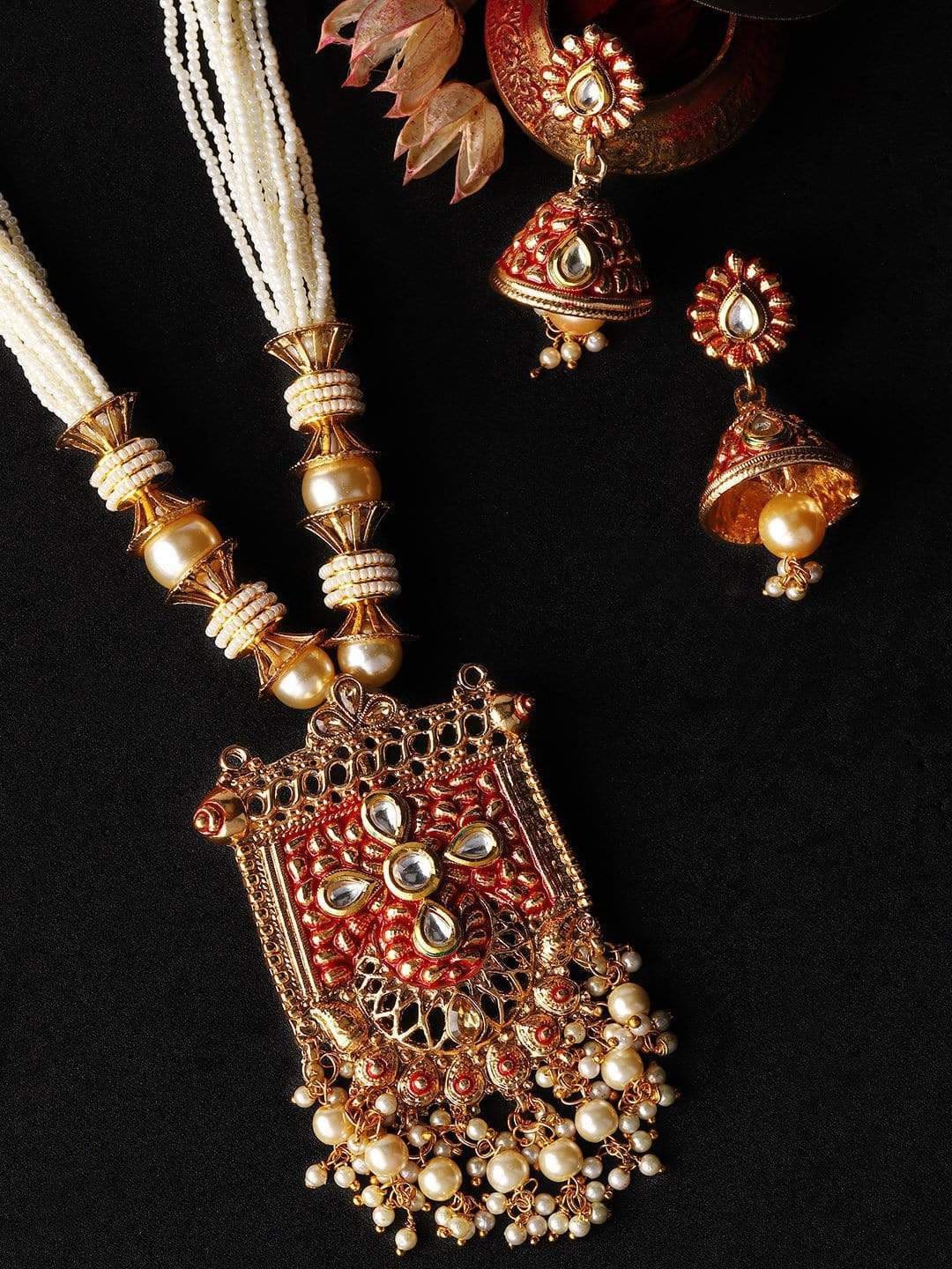 Rubans Gold-Plated White Stone-Studded & Pearl Beaded Handcrafted Statement Jewellery Set
Rubans Gold-Plated White Stone-Studded & Pearl Beaded Handcrafted Statement Jewellery Set