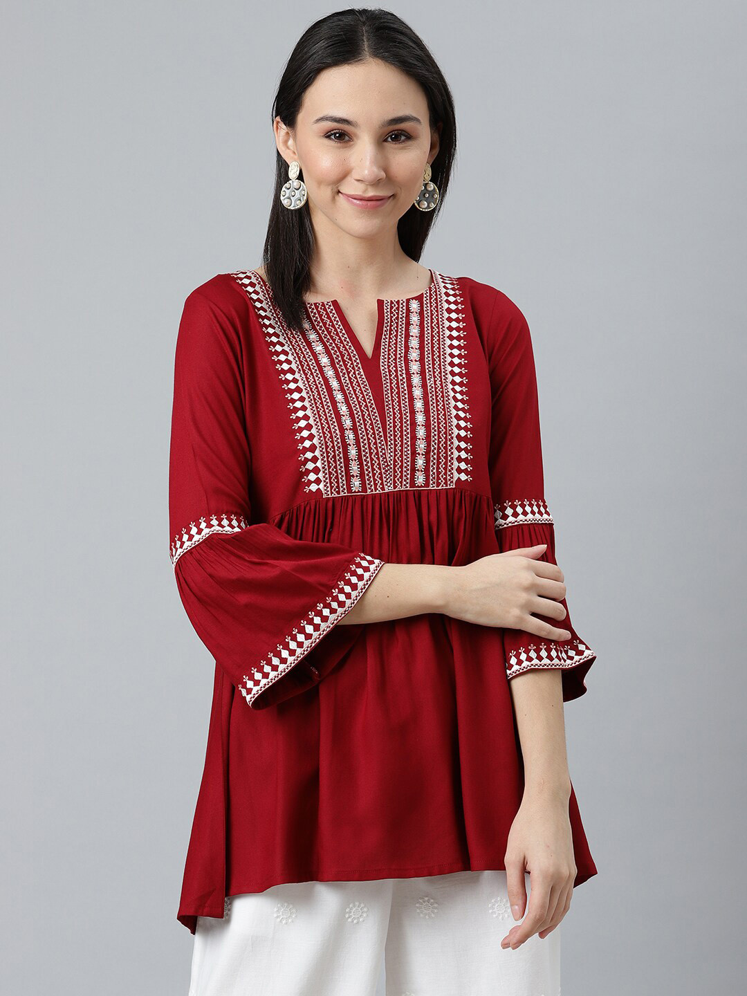 Libas Maroon & White Ethnic Motifs Embroidered V-Neck Flared Sleeves Thread Work Kurti 
Libas Maroon & White Ethnic Motifs Embroidered V-Neck Flared Sleeves Thread Work Kurti