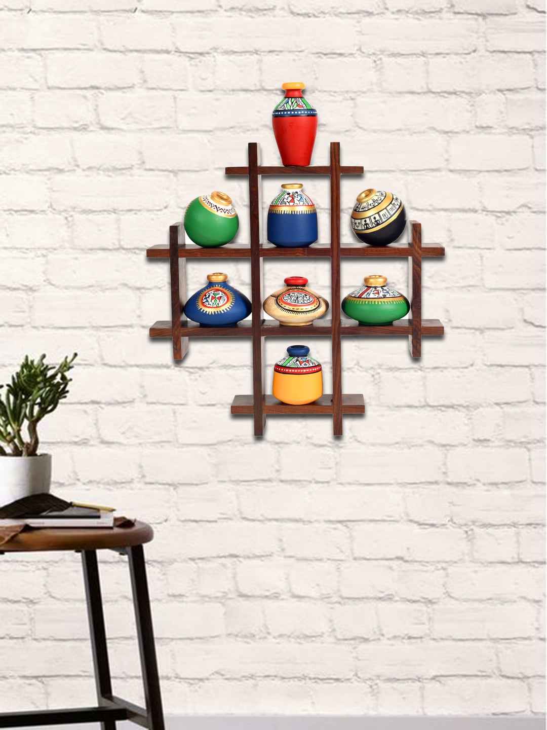 Unravel India Set Of 8 Assorted Terracotta Warli Handpainted Pots With Sheesham Wooden Frame
Unravel India Set Of 8 Assorted Terracotta Warli Handpainted Pots With Sheesham Wooden Frame