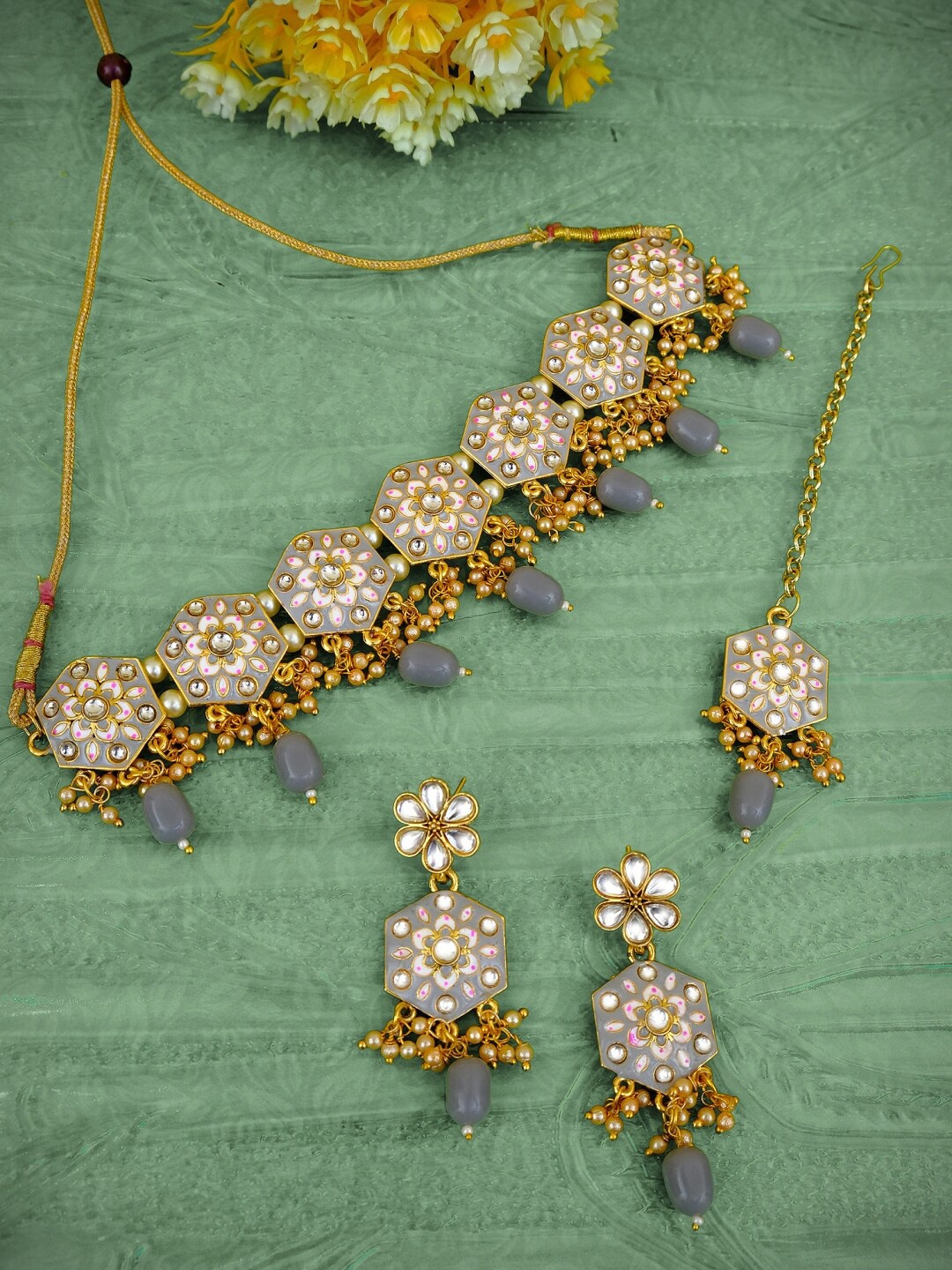 Crunchy Fashion Gold-Plated White & Grey Stone-Studded & Beaded Antique Jewellery Set
Crunchy Fashion Gold-Plated White & Grey Stone-Studded & Beaded Antique Jewellery Set