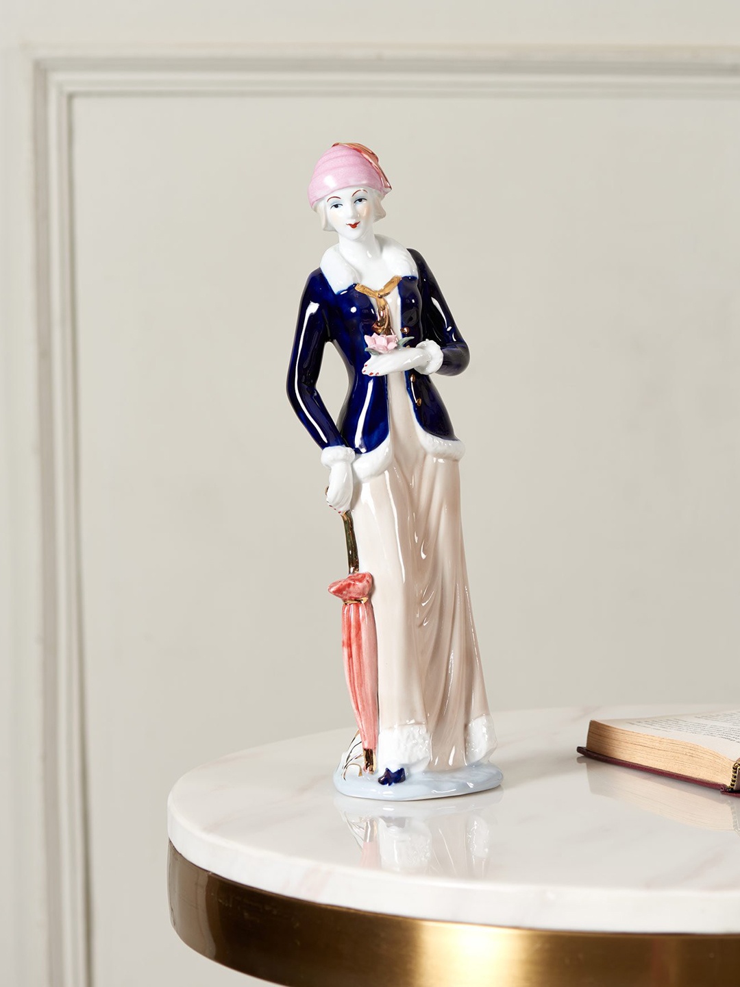 THEDECORKART Blue & Beige Hand-Painted Victorian Lady Fine Porcelain Figurine Showpiece
THEDECORKART Blue & Beige Hand-Painted Victorian Lady Fine Porcelain Figurine Showpiece