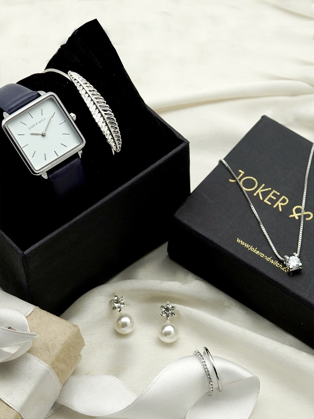 JOKER & WITCH Women White & Silver-Toned Happy You Love Stack Watch Gift Set JWLS154
JOKER & WITCH Women White & Silver-Toned Happy You Love Stack Watch Gift Set JWLS154