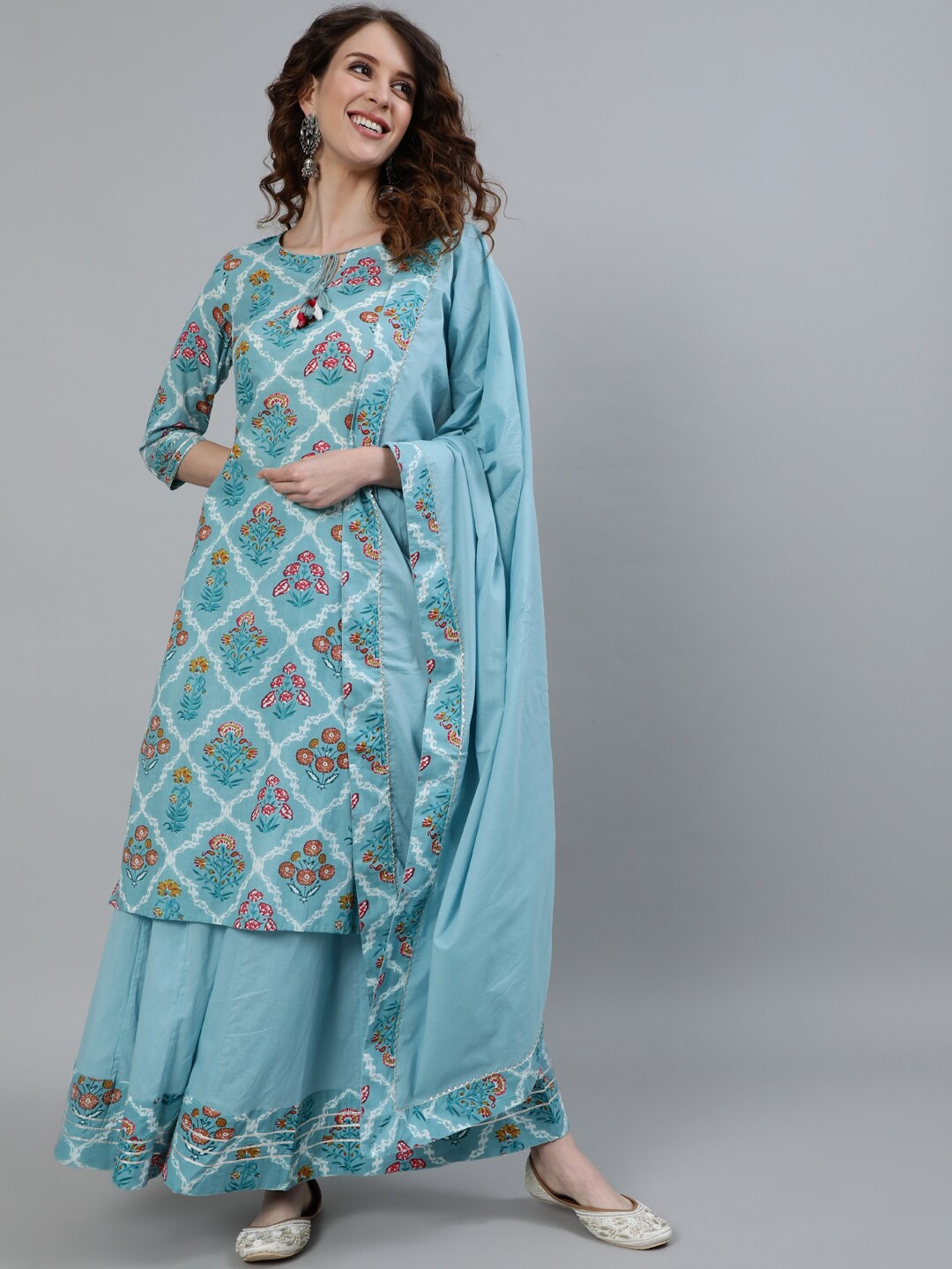Ishin Women Blue Ethnic Motifs Printed Regular Pure Cotton Kurta with Sharara & With Dupatta
Ishin Women Blue Ethnic Motifs Printed Regular Pure Cotton Kurta with Sharara & With Dupatta