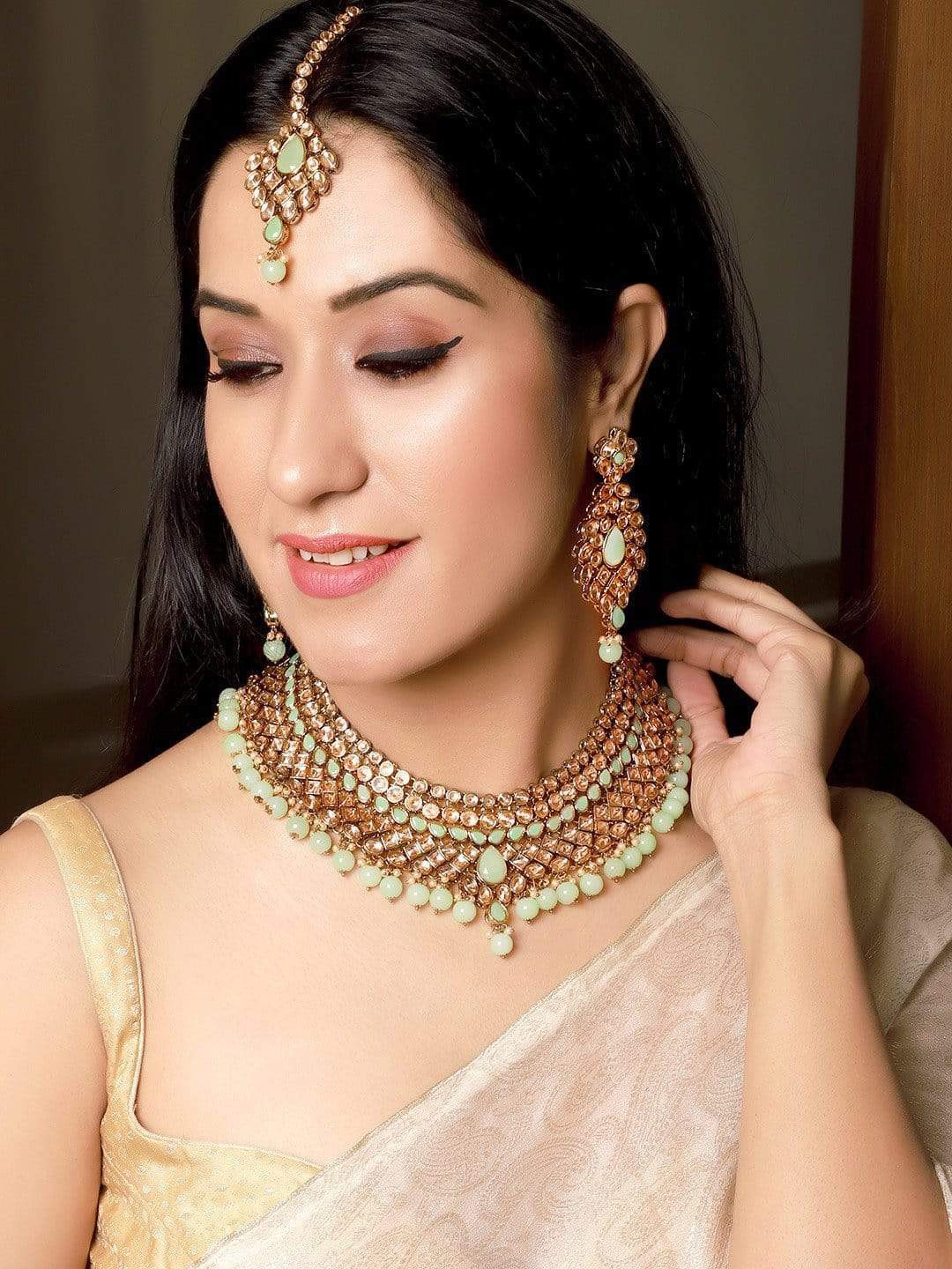 Rubans Gold-Plated Beige & Lime Green Stone-Studded Beaded Elegant Statement Jewellery Set
Rubans Gold-Plated Beige & Lime Green Stone-Studded Beaded Elegant Statement Jewellery Set