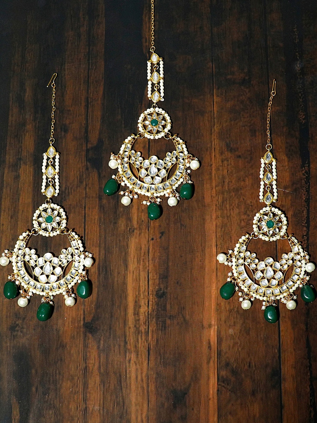 KARATCART Gold-Plated White & Green Kundan-Studded & Beaded Handcrafted Jewellery Set
KARATCART Gold-Plated White & Green Kundan-Studded & Beaded Handcrafted Jewellery Set