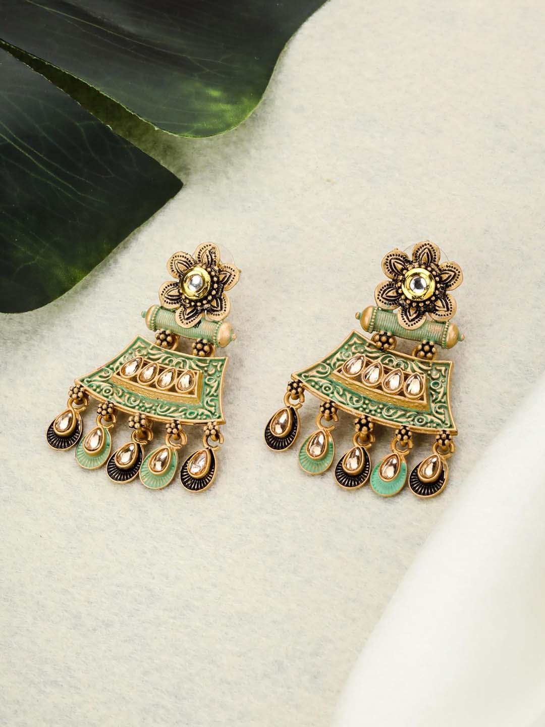 Priyaasi Gold-Plated & Sea Green Kundan Studded Handcrafted Contemporary Drop Earrings
Priyaasi Gold-Plated & Sea Green Kundan Studded Handcrafted Contemporary Drop Earrings
