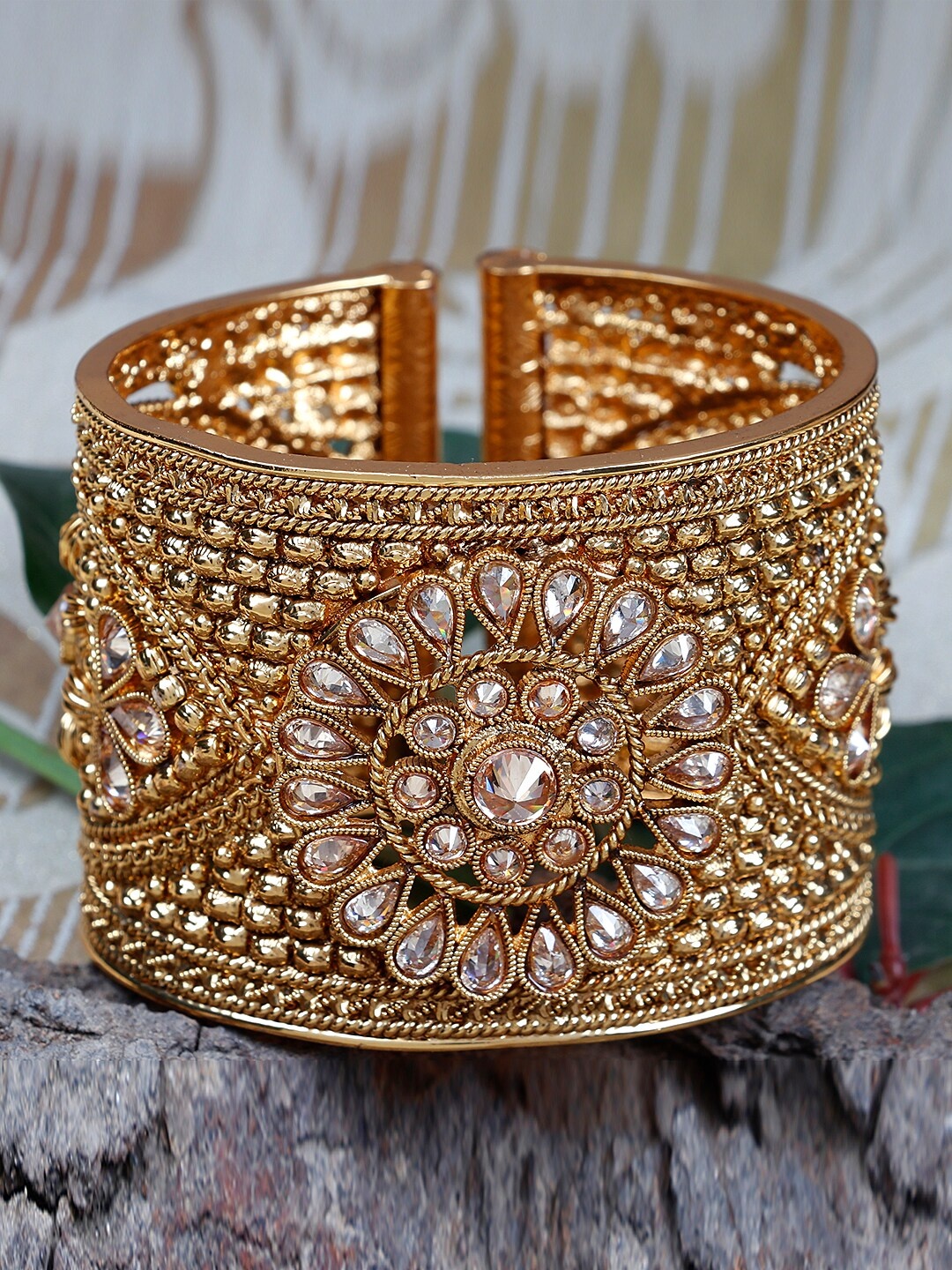 Priyaasi Women Gold-Toned & Transparent Brass Kundan Handcrafted Gold-Plated Cuff Bracelet
Priyaasi Women Gold-Toned & Transparent Brass Kundan Handcrafted Gold-Plated Cuff Bracelet