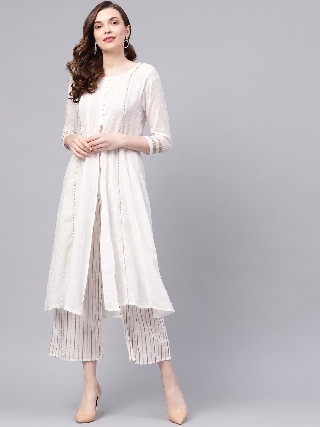 Ishin Women White & Gold Striped High Slit Pure Cotton Gotta Patti Kurta with Palazzos
Ishin Women White & Gold Striped High Slit Pure Cotton Gotta Patti Kurta with Palazzos