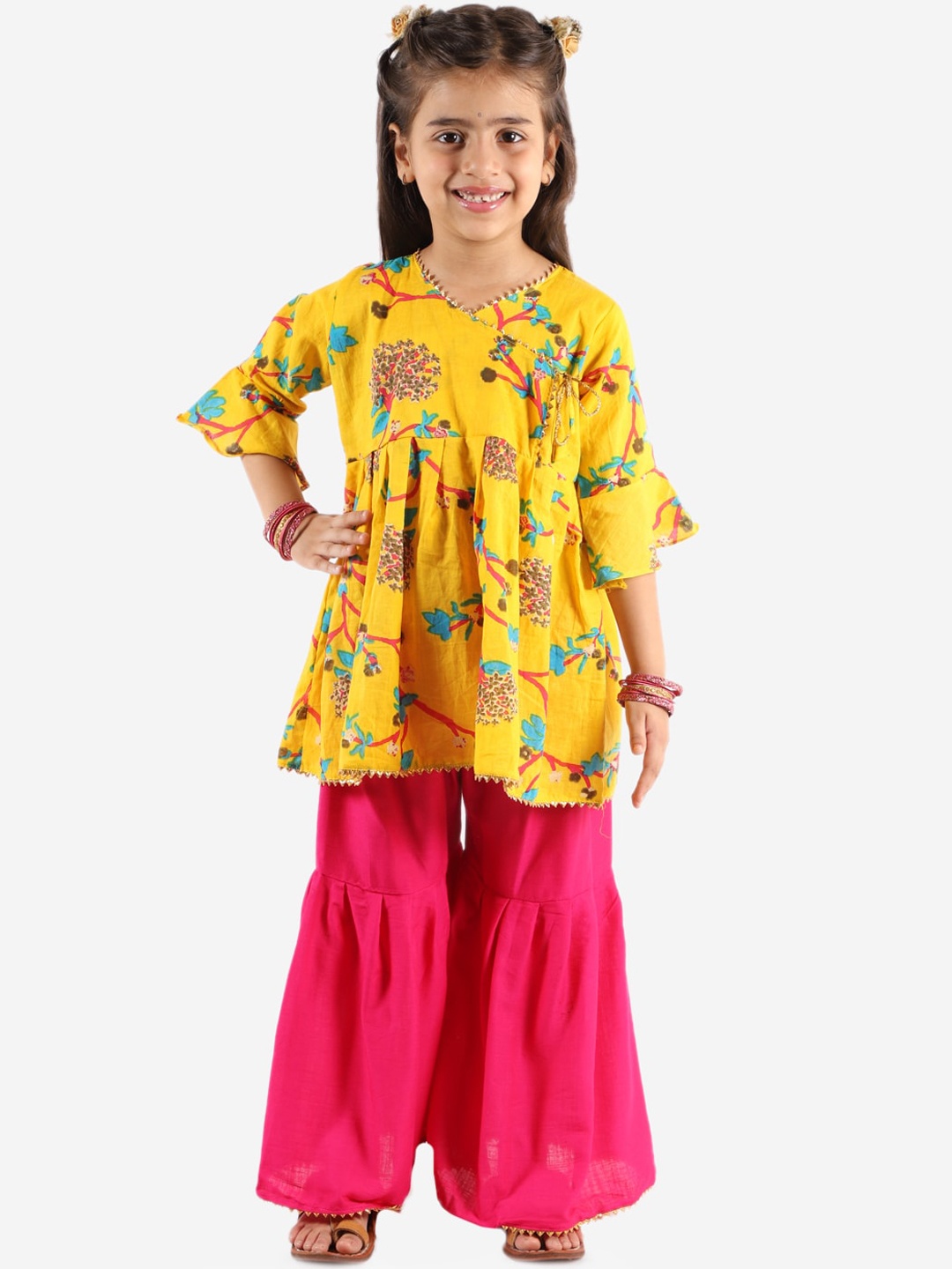 Chipbeys Girls Yellow & Pink Pure Cotton Floral Printed Angrakha Kurta With Sharara
Chipbeys Girls Yellow & Pink Pure Cotton Floral Printed Angrakha Kurta With Sharara
