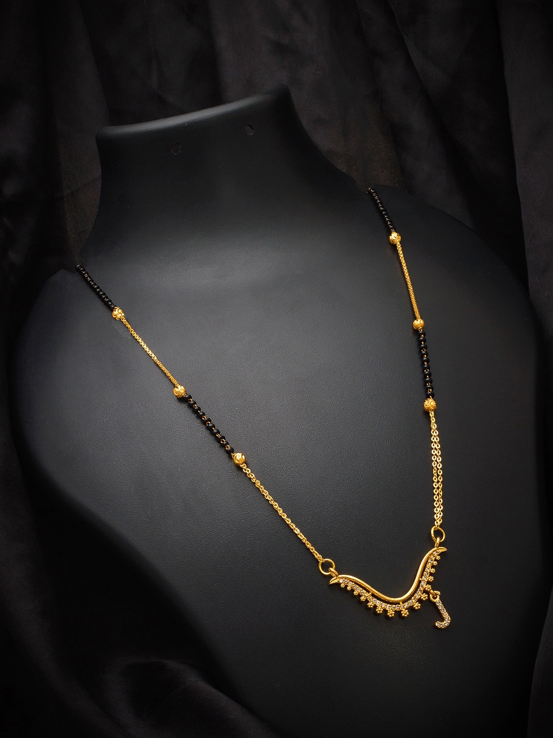 aadita Gold-Plated Black Beaded White AD-Studded Alphabet Initials Letter J Mangalsutra
aadita Gold-Plated Black Beaded White AD-Studded Alphabet Initials Letter J Mangalsutra