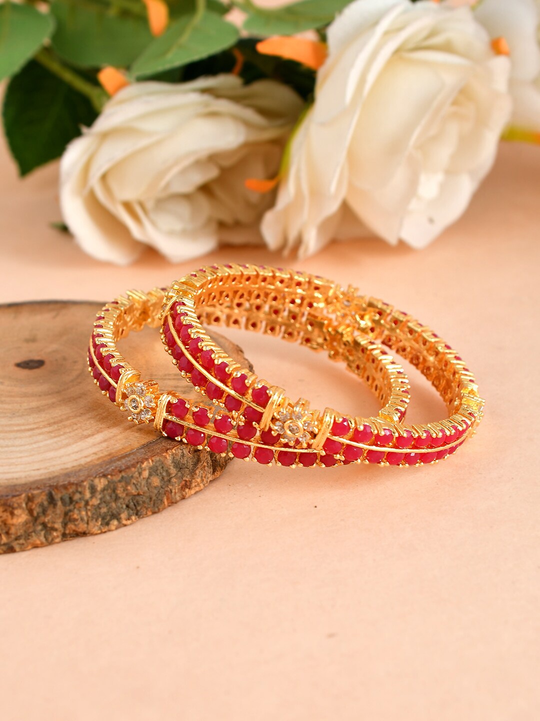 Silvermerc Designs Set Of 2 Red Gold-Plated Handmade Faux Ruby & AD-Studded Jadau Bangles
Silvermerc Designs Set Of 2 Red Gold-Plated Handmade Faux Ruby & AD-Studded Jadau Bangles