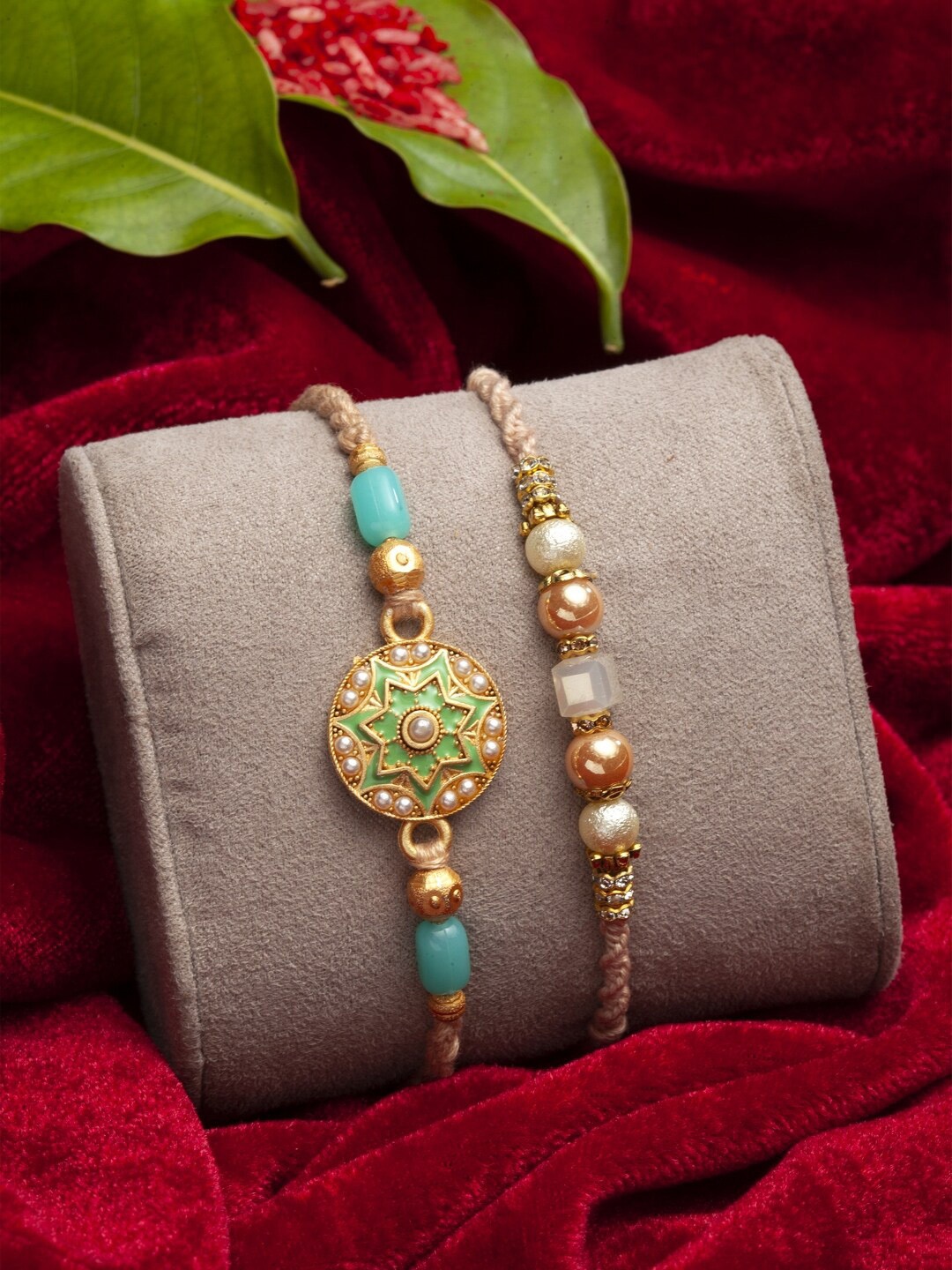 PANASH Set Of 2 Gold-Toned & Turquoise Blue Stone-Studded Beaded Floral Fashion Rakhis, Beige
PANASH Set Of 2 Gold-Toned & Turquoise Blue Stone-Studded Beaded Floral Fashion Rakhis, Beige