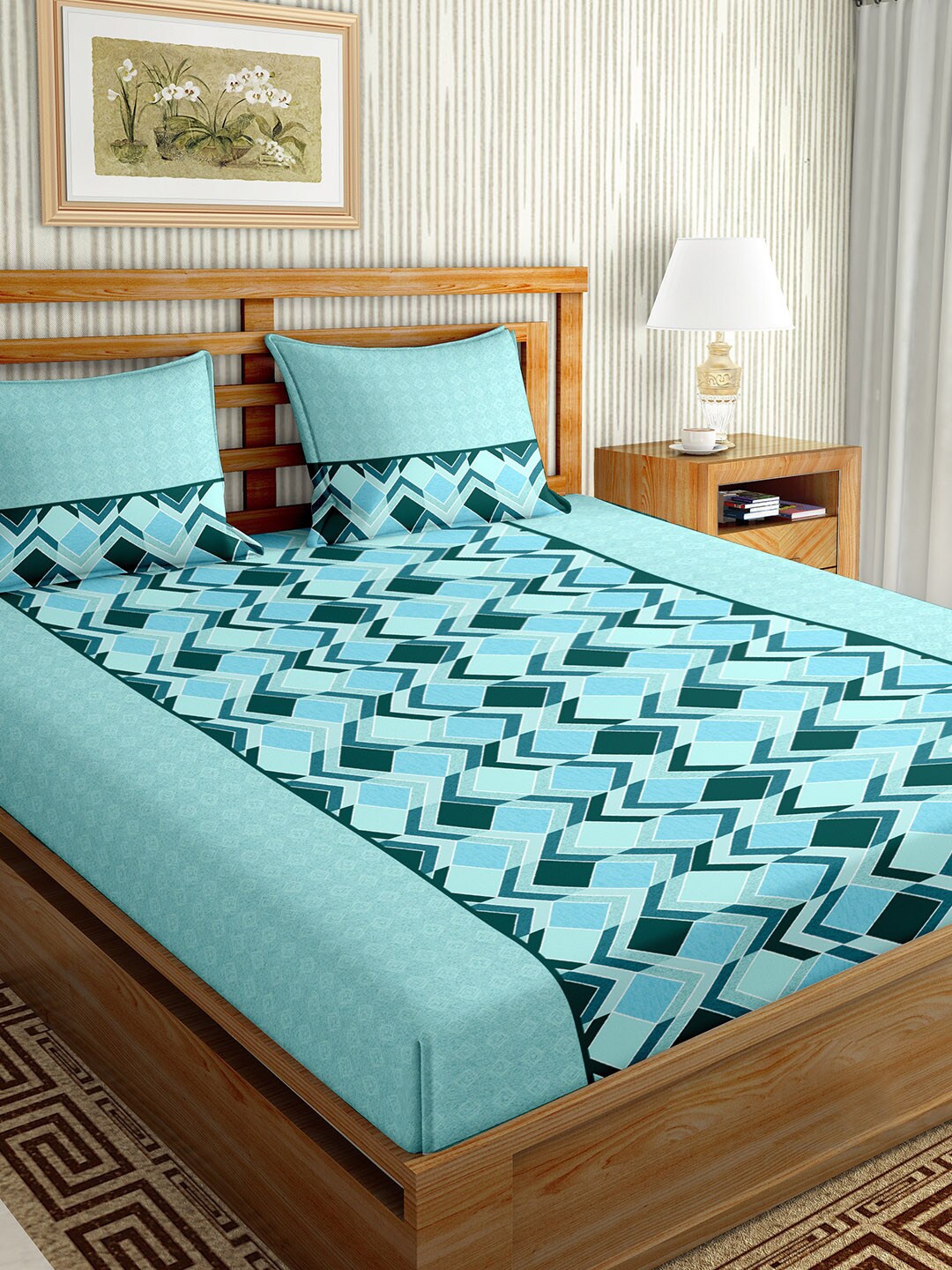BELLA CASA Turquoise Blue & Green Geometric 180 TC King Bedsheet with 2 Pillow Covers
BELLA CASA Turquoise Blue & Green Geometric 180 TC King Bedsheet with 2 Pillow Covers