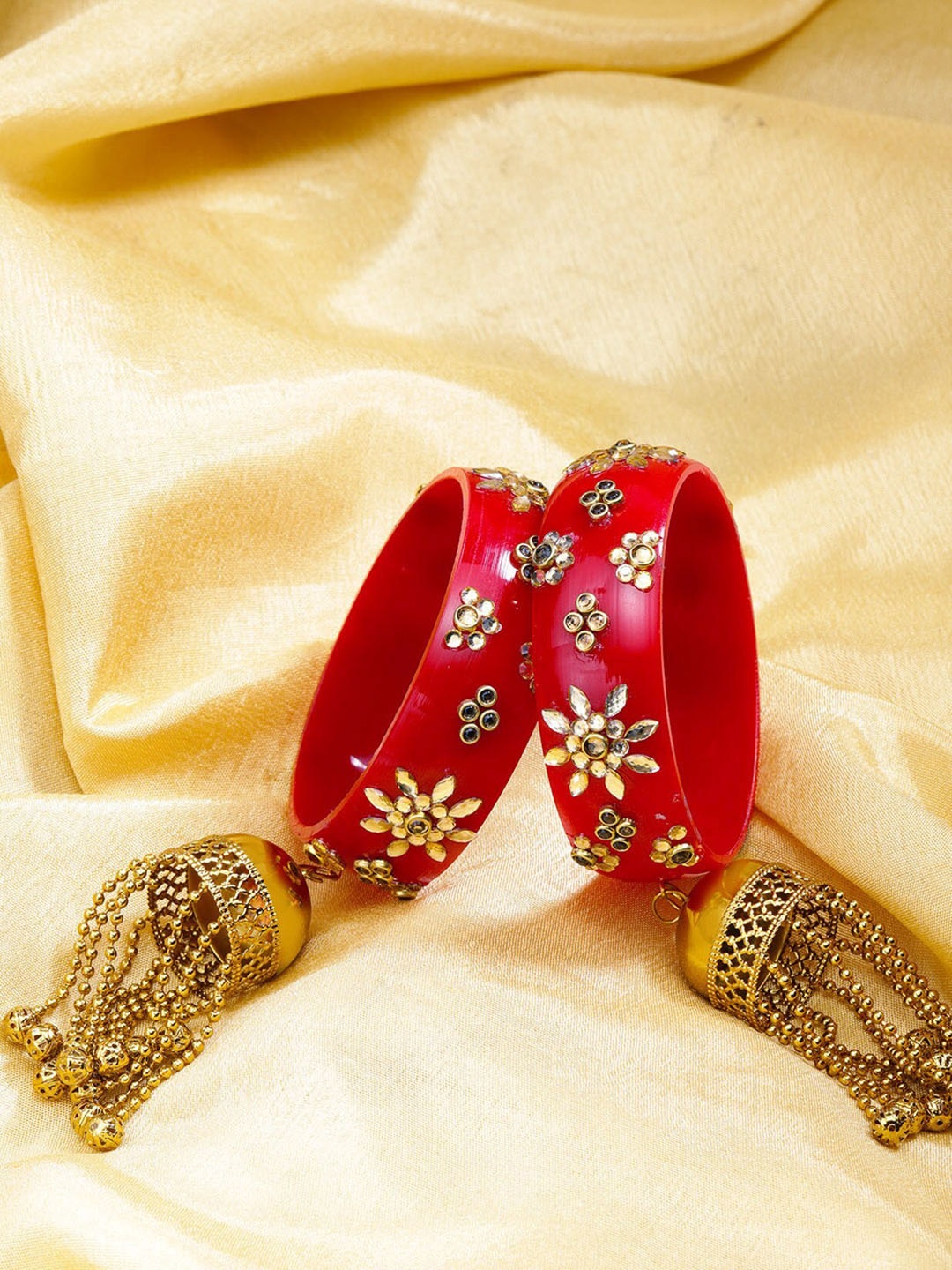 Priyaasi Set Of 2 Gold-Plated Red Stone-Embellished Floral Patterned Bridal Kaleera Bangles
Priyaasi Set Of 2 Gold-Plated Red Stone-Embellished Floral Patterned Bridal Kaleera Bangles