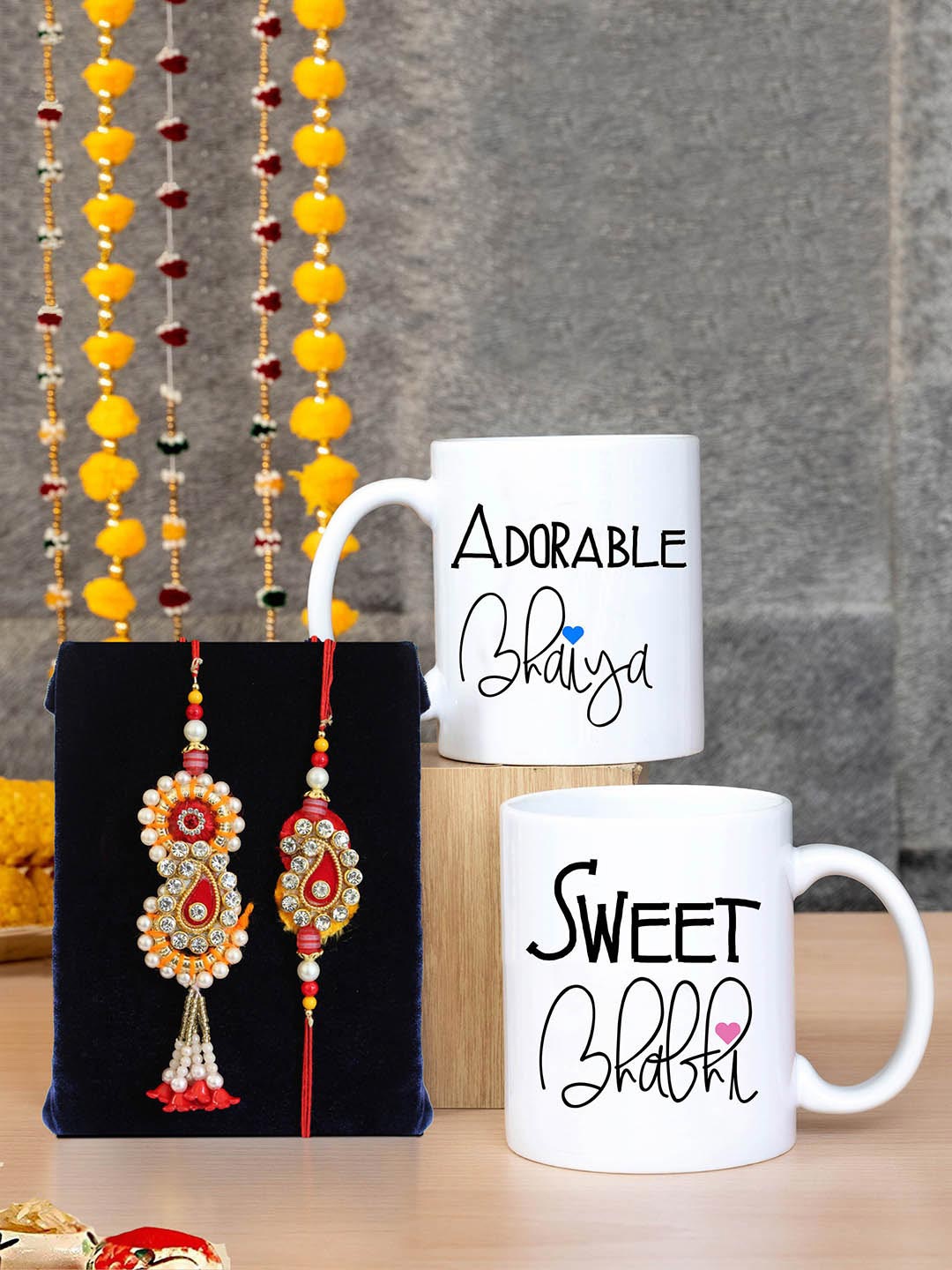 TIED RIBBONS Set Of 3 Bhaiya Bhabhi Rakhi Set with Printed Coffee Mug Combo Gift Pack, White
TIED RIBBONS Set Of 3 Bhaiya Bhabhi Rakhi Set with Printed Coffee Mug Combo Gift Pack, White