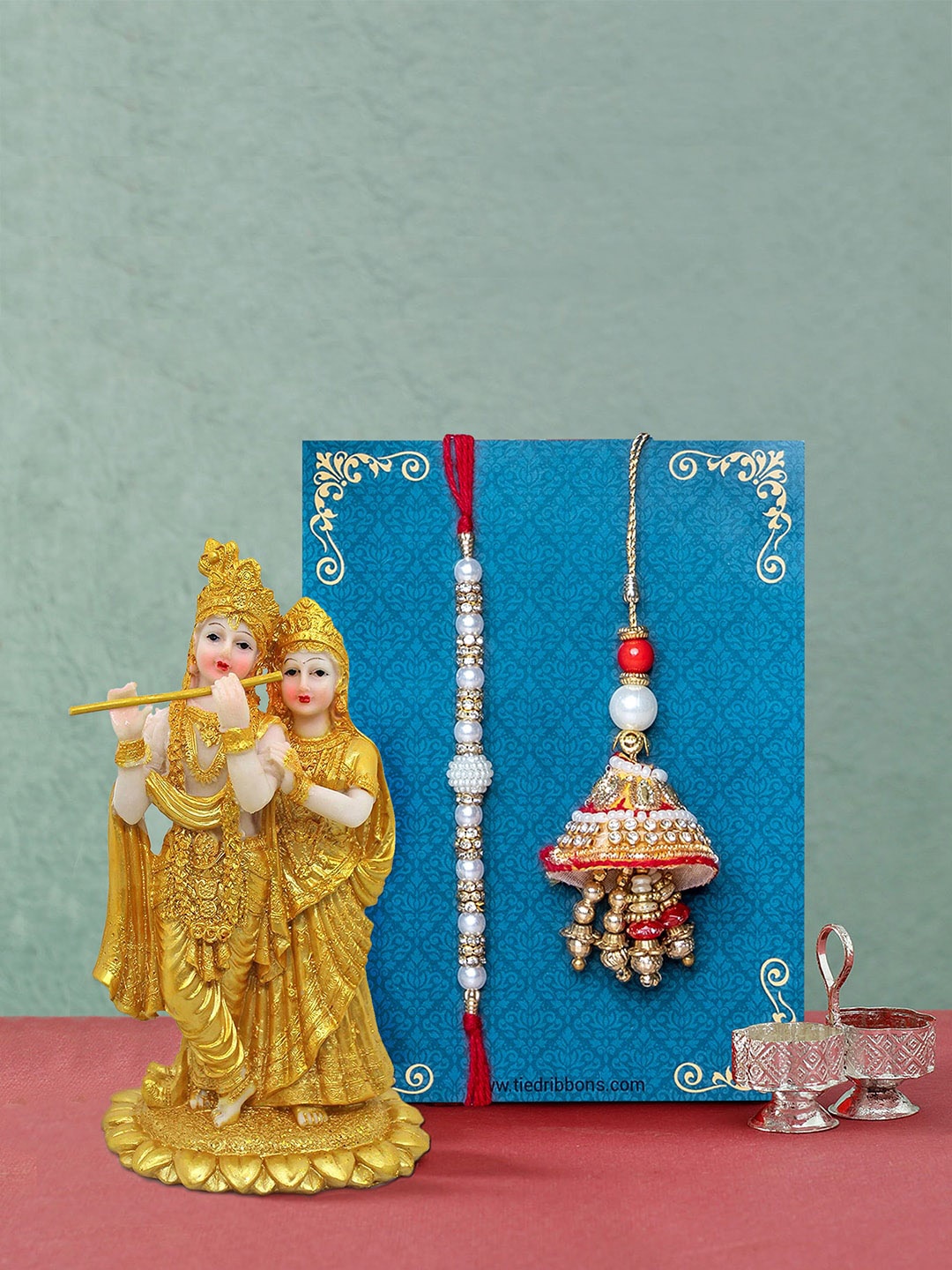 TIED RIBBONS White Handcrafted Bhaiya Bhabhi Lumba Rakhi with Radha Krishna Gift Pack
TIED RIBBONS White Handcrafted Bhaiya Bhabhi Lumba Rakhi with Radha Krishna Gift Pack
