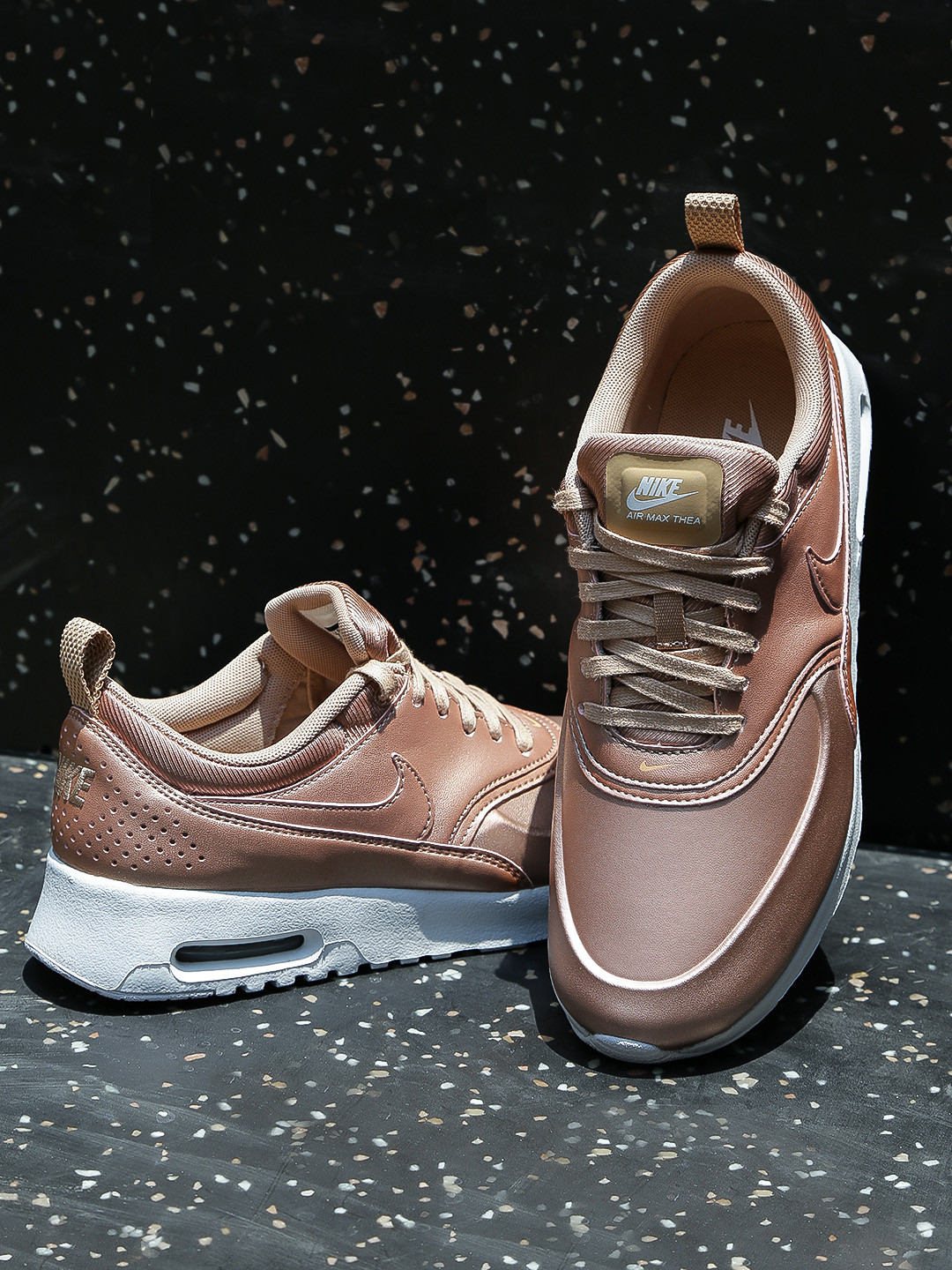 womens rose gold nike trainers