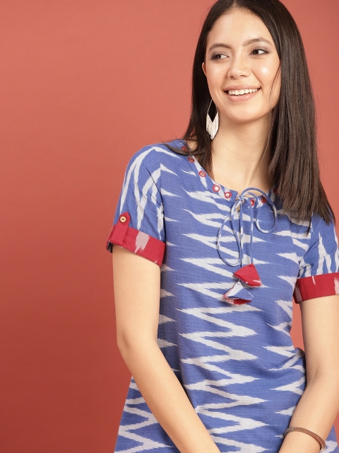 Taavi Women Blue & White Woven Design Cotton Ikat Top With Mirror Work & Tie-Up Detailing
Taavi Women Blue & White Woven Design Cotton Ikat Top With Mirror Work & Tie-Up Detailing