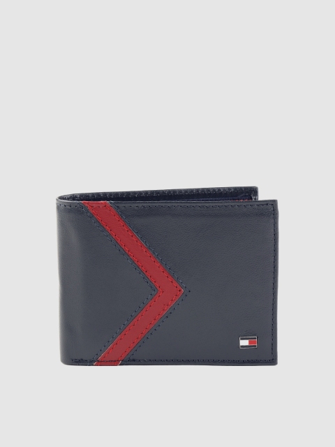 Tommy Hilfiger Men Navy Blue & Red Solid Leather Two Fold Wallet with Striped Detail
Tommy Hilfiger Men Navy Blue & Red Solid Leather Two Fold Wallet with Striped Detail