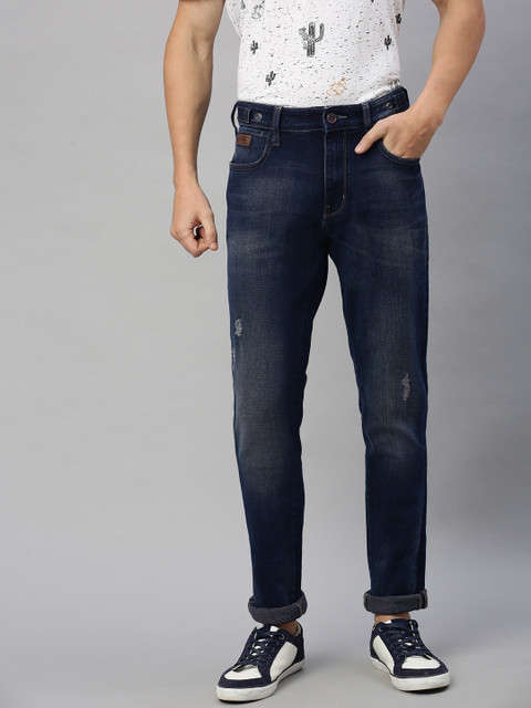 Wrangler Men Blue Bostin Slim Fit Mid-Rise Low Distress Stretchable Jeans 
Wrangler Men Blue Bostin Slim Fit Mid-Rise Low Distress Stretchable Jeans