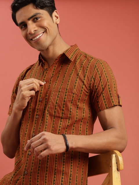 Taavi Men Mustard Brown & Green Bagru Printed Sustainable Shirt with Button-Down Collar
Taavi Men Mustard Brown & Green Bagru Printed Sustainable Shirt with Button-Down Collar