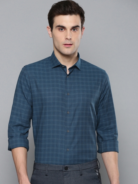 Louis Philippe Ath.Work Men Teal Blue & Charcoal Grey Super Slim Fit Checked Casual Shirt
Louis Philippe Ath.Work Men Teal Blue & Charcoal Grey Super Slim Fit Checked Casual Shirt