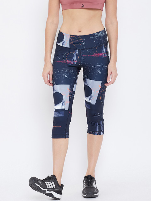Reebok Women Navy Workout Ready AOP Printed Training Capri Tights, Navy blue 
Reebok Women Navy Workout Ready AOP Printed Training Capri Tights, Navy blue