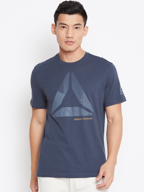Reebok Men Navy Printed Graphic Series One Series Shift Blur Training T-shirt, Navy blue
Reebok Men Navy Printed Graphic Series One Series Shift Blur Training T-shirt, Navy blue