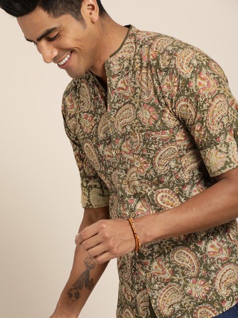 Taavi Men Olive Green & Beige Kalamkari Block Printed Sustainable Shirt with Roll-Up Sleeves
Taavi Men Olive Green & Beige Kalamkari Block Printed Sustainable Shirt with Roll-Up Sleeves
