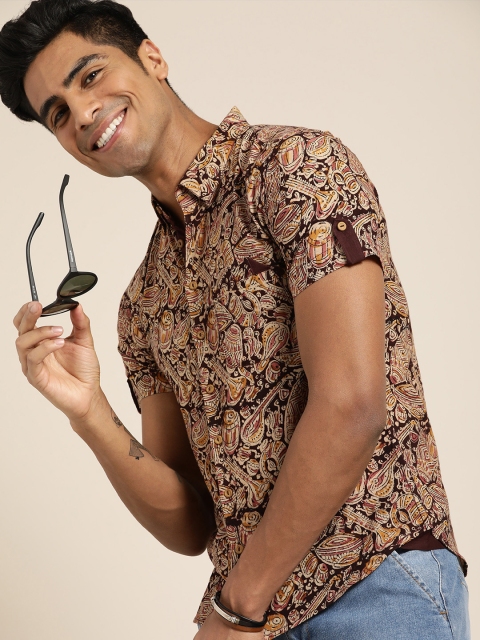 Taavi Men Brown & Beige Kalamkari Block Printed Regular Fit Sustainable Shirt with Button-Down Collar
Taavi Men Brown & Beige Kalamkari Block Printed Regular Fit Sustainable Shirt with Button-Down Collar