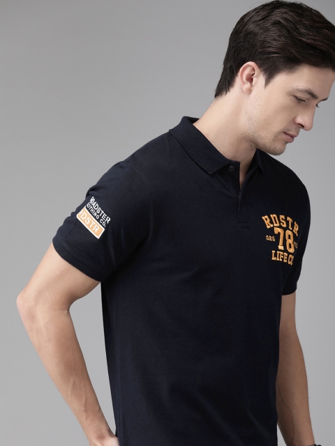The Roadster Lifestyle Co Men Navy Blue Solid Polo Collar Pure Cotton T-shirt With Brand Carrier Embroidered Detail
The Roadster Lifestyle Co Men Navy Blue Solid Polo Collar Pure Cotton T-shirt With Brand Carrier Embroidered Detail