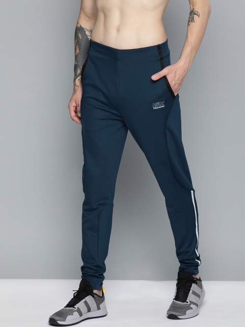 HRX by Hrithik Roshan Men Teal Blue Solid Rapid-Dry Slim-Fit Mid-Rise Training Joggers
HRX by Hrithik Roshan Men Teal Blue Solid Rapid-Dry Slim-Fit Mid-Rise Training Joggers