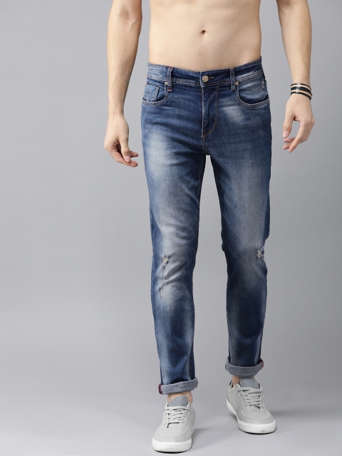 The Roadster Lifestyle Co Men Blue Slim Fit Mid-Rise Mildly Distressed Stretchable Jeans
The Roadster Lifestyle Co Men Blue Slim Fit Mid-Rise Mildly Distressed Stretchable Jeans