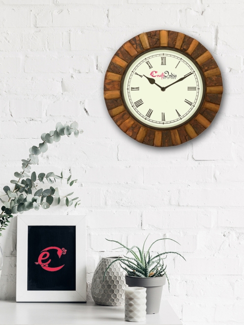 eCraftIndia Beige Handcrafted Round Solid Analogue Wall Clock (30.48 x 30.48 x 10.16)
eCraftIndia Beige Handcrafted Round Solid Analogue Wall Clock (30.48 x 30.48 x 10.16)