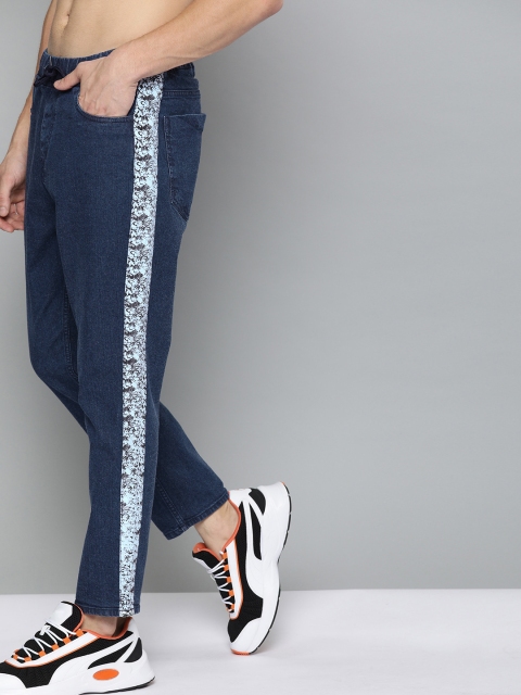 Kook N Keech Men Blue Regular Fit Mid-Rise Ankle-Length Jeans With Marvel comic SideStripe
Kook N Keech Men Blue Regular Fit Mid-Rise Ankle-Length Jeans With Marvel comic SideStripe