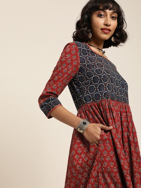 Taavi Women Maroon & Navy Blue Ajrakh Hand Block Print Maxi Sustainable Dress with Gathers
Taavi Women Maroon & Navy Blue Ajrakh Hand Block Print Maxi Sustainable Dress with Gathers