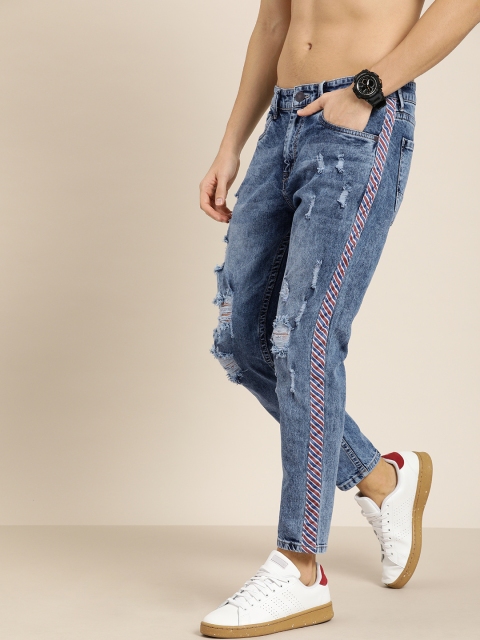 Moda Rapido Men Blue Ankle Slim Tapered Fit Mid-Rise Mildly Distressed Stretchable Jeans
Moda Rapido Men Blue Ankle Slim Tapered Fit Mid-Rise Mildly Distressed Stretchable Jeans