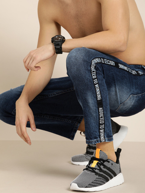 Moda Rapido Men Blue Ankle Slim Tapered Fit Mid-Rise Mildly Distressed Stretchable Jeans
Moda Rapido Men Blue Ankle Slim Tapered Fit Mid-Rise Mildly Distressed Stretchable Jeans
