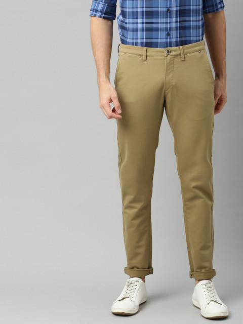 U.S. Polo Assn. Men Mustard Slim Fit Solid Regular Trousers 
U.S. Polo Assn. Men Mustard Slim Fit Solid Regular Trousers
