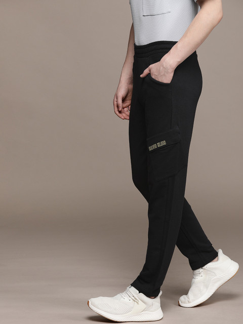 Calvin Klein Jeans Performance Men Black Straight Fit Solid Joggers with Side Stripes
Calvin Klein Jeans Performance Men Black Straight Fit Solid Joggers with Side Stripes