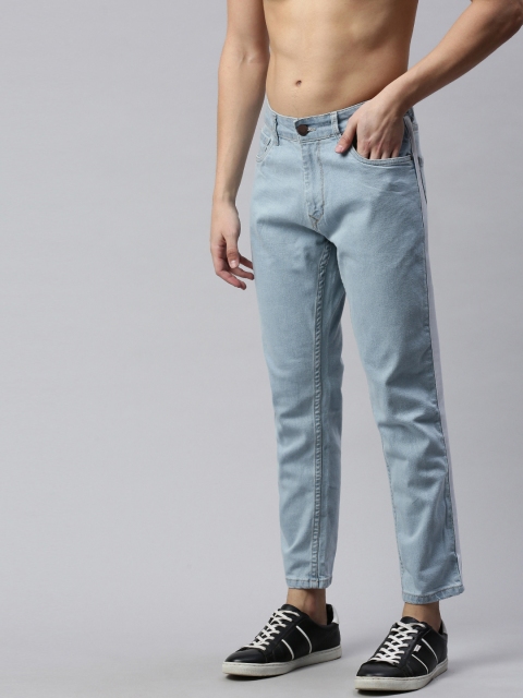 HERE&NOW Men Blue Regular Fit Mid-Rise Clean Look Stretchable Jeans with Side Stripes
HERE&NOW Men Blue Regular Fit Mid-Rise Clean Look Stretchable Jeans with Side Stripes