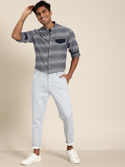 Taavi Men Grey & White Ikat Woven Design Regular Fit Casual Shirt with Roll-Up Sleeves
Taavi Men Grey & White Ikat Woven Design Regular Fit Casual Shirt with Roll-Up Sleeves