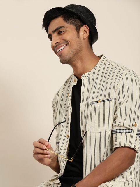 Taavi Men Off-White & Black Striped Handloom Woven Legacy Shirt with Roll-Up Sleeves
Taavi Men Off-White & Black Striped Handloom Woven Legacy Shirt with Roll-Up Sleeves