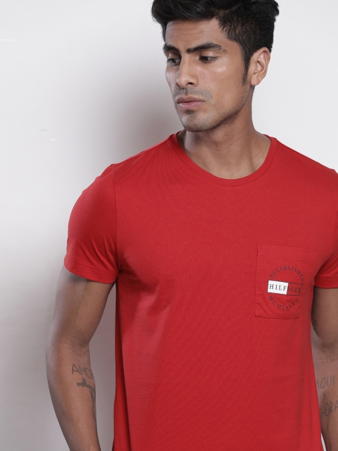 Tommy Hilfiger Men Red Solid Round Neck Organic Cotton T-shirt with Pocket Detailing
Tommy Hilfiger Men Red Solid Round Neck Organic Cotton T-shirt with Pocket Detailing