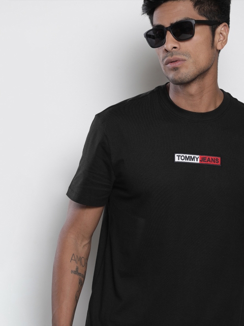 Tommy Hilfiger Men Black Solid Round Neck Pure Cotton T-shirt with Embroidered Detailing
Tommy Hilfiger Men Black Solid Round Neck Pure Cotton T-shirt with Embroidered Detailing