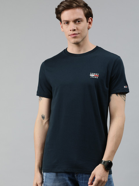 Tommy Hilfiger Men Navy Blue Solid Slim Fit Round Neck Pure Cotton T-shirt with Print Detail
Tommy Hilfiger Men Navy Blue Solid Slim Fit Round Neck Pure Cotton T-shirt with Print Detail