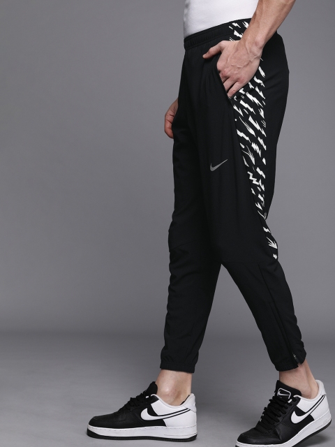 Nike Men Black Solid Dri-Fit Standard Fit ESSNTL Running Joggers With Printed Detailing
Nike Men Black Solid Dri-Fit Standard Fit ESSNTL Running Joggers With Printed Detailing