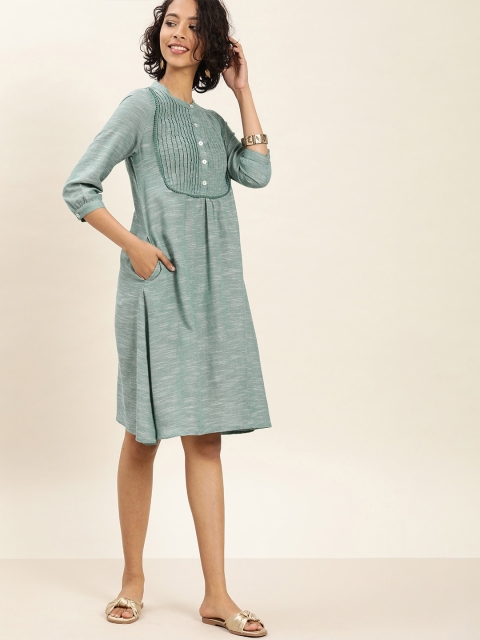 Taavi Women Green Solid Woven Legacy A-Line Sustainable Dress with Pin-Tucks & Gathers
Taavi Women Green Solid Woven Legacy A-Line Sustainable Dress with Pin-Tucks & Gathers